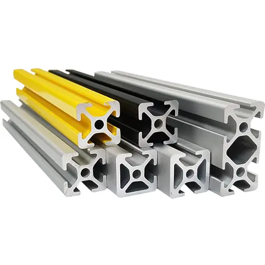A group of T-slot aluminum extrusions in silver, black, and yellow, showing different cross-section profiles.